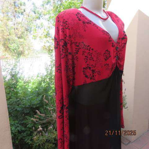 Red long sleeve with black floral print with long sheer black bottom. Size 42-44