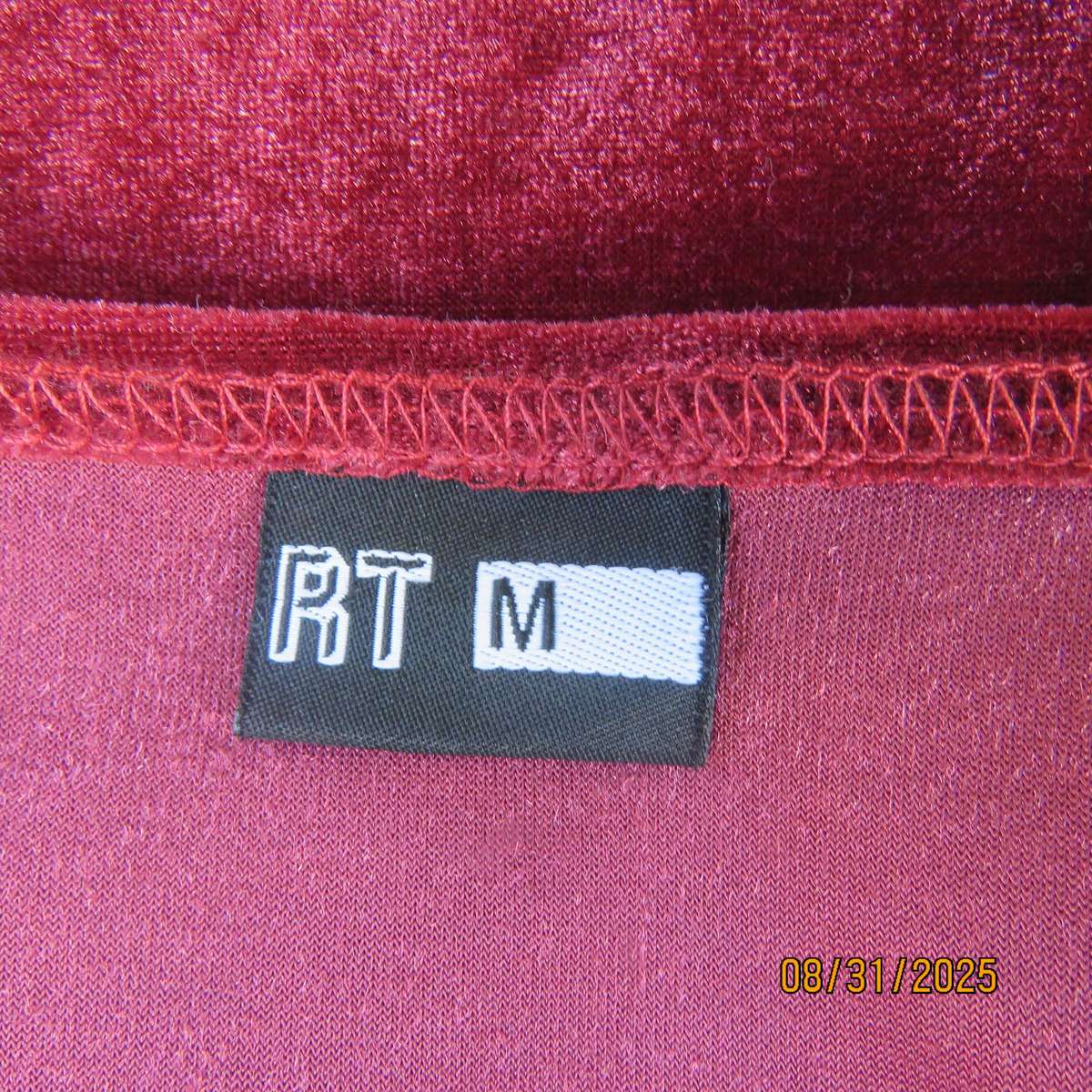 Red plum strappy dress in stretch polyester velvet with V bustline. Size 34.
