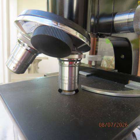 Vintage Bausch & Lomb monocular microscope model DD887 with extra eye pieces from USA