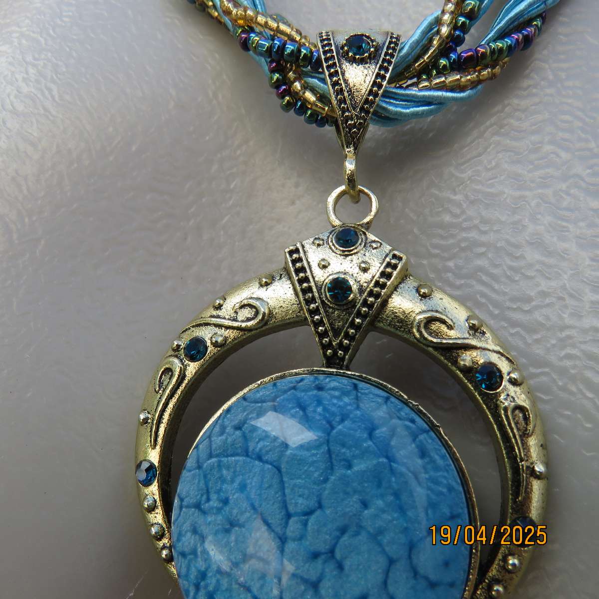 Smart turquoise stone on gold base pendant hang on cord and bead strap. New