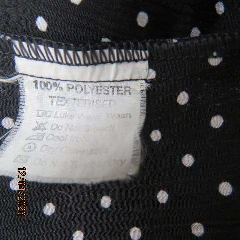WILD OATS black and white polka dot tailored top with V neck and button front, size 36