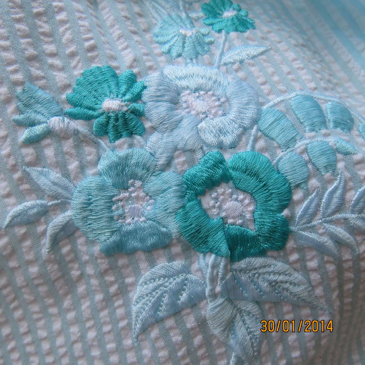Aqua luxury embroidered button down top .White-Aqua stripes Size 40