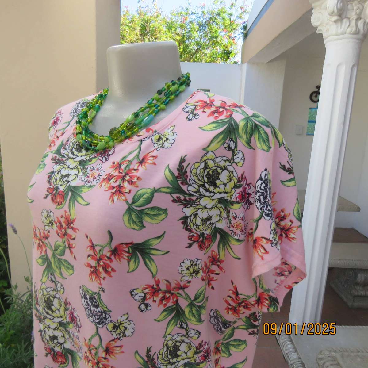 Light peach with crimson-yellow-green floral print slip over top. Tiny cut-on sleeves. Size 42