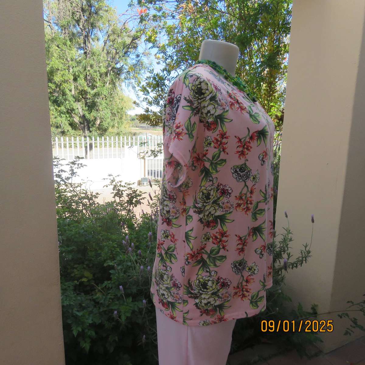 Light peach with crimson-yellow-green floral print slip over top. Tiny cut-on sleeves. Size 42