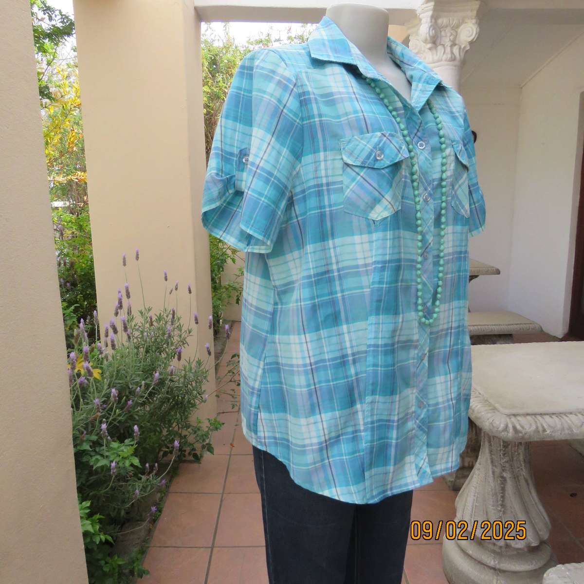 Blue-turquoise check ladies short sleeve shirt in size 42.