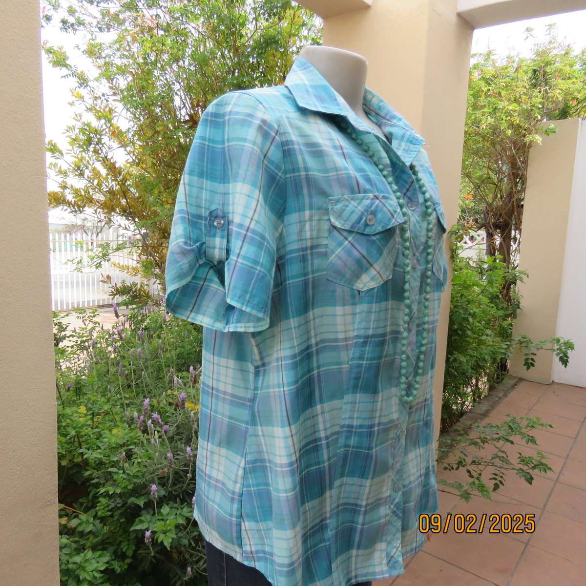 Blue-turquoise check ladies short sleeve shirt in size 42.