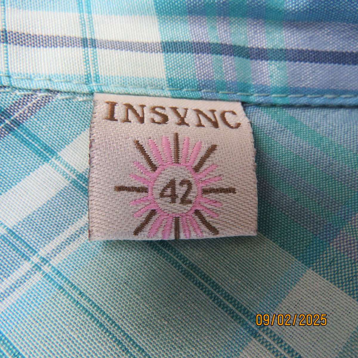 Blue-turquoise check ladies short sleeve shirt in size 42.