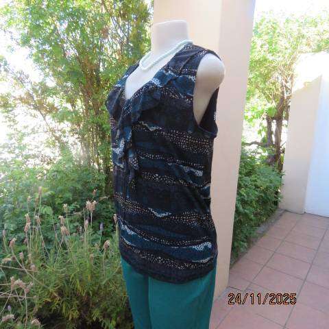 ROCKMANS sheer polyester sleeveless lined top in black with jade-light blue-cream print. Size 38