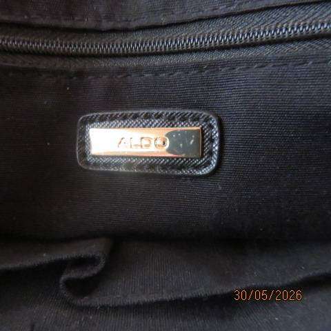 ALDO black hand-sling bag with zip-up closure and gilded lock and key. Never used