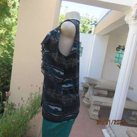 ROCKMANS sheer polyester sleeveless lined top in black with jade-light blue-cream print. Size 38