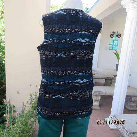 ROCKMANS sheer polyester sleeveless lined top in black with jade-light blue-cream print. Size 38