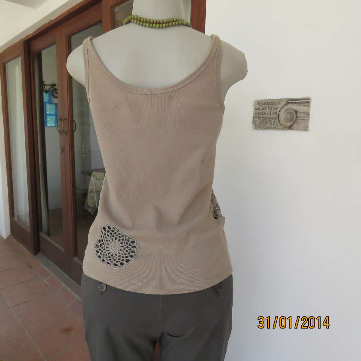 QUEENSPARK sage green strappy top in 100% ribbed cotton. Size 36 to 38. Crochet circle inlays.As new