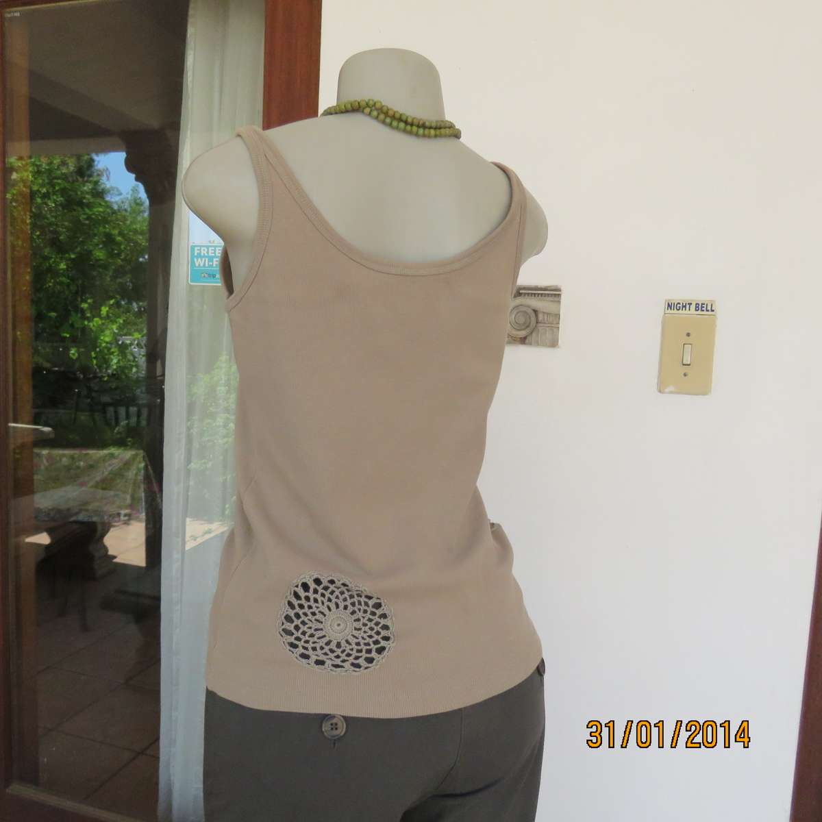 QUEENSPARK sage green strappy top in 100% ribbed cotton. Size 36 to 38. Crochet circle inlays.As new