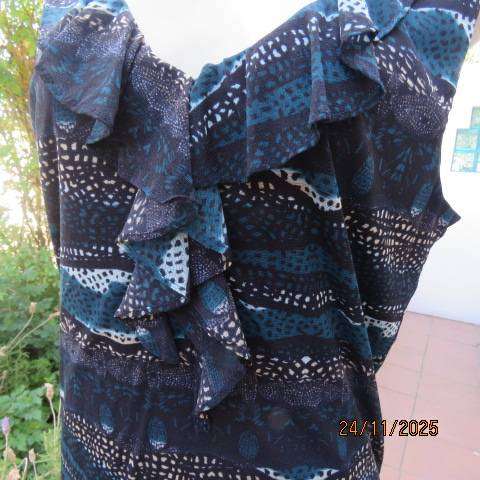 ROCKMANS sheer polyester sleeveless lined top in black with jade-light blue-cream print. Size 38