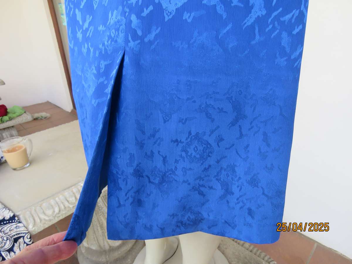 Embossed royal blue silky polyester fully lined pencil skirt size 36. As new