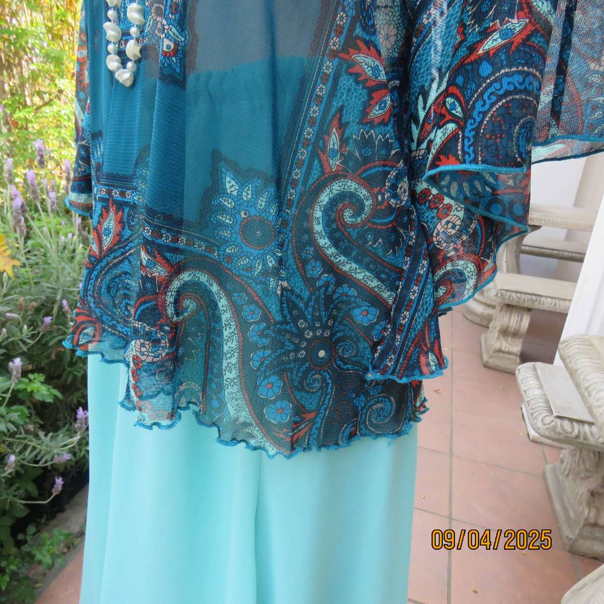 NEWS halfmoon sheer jade colour top with aqua-rust geometric print. Size 38