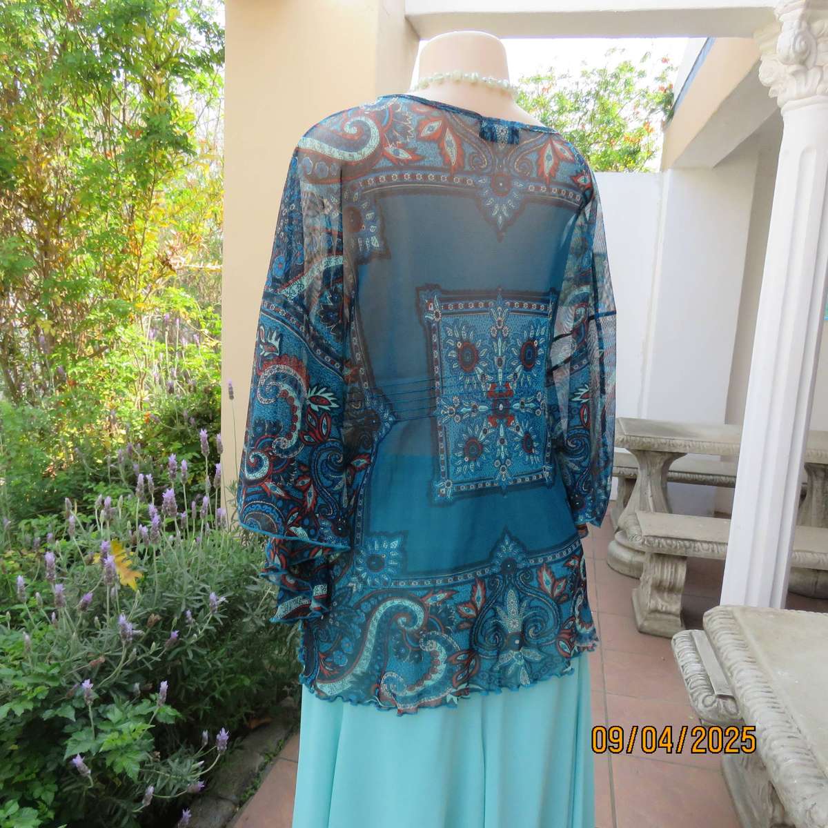 NEWS halfmoon sheer jade colour top with aqua-rust geometric print. Size 38