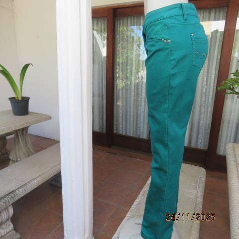 MILADYS jade green slim fit denim polycotton jeans in size 34