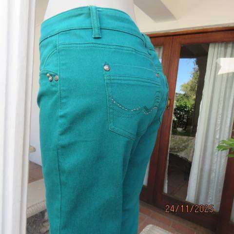 MILADYS jade green slim fit denim polycotton jeans in size 34