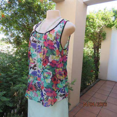 Vibrant floral sleeveless sheer polyester top with black edging and back tie - Size 36