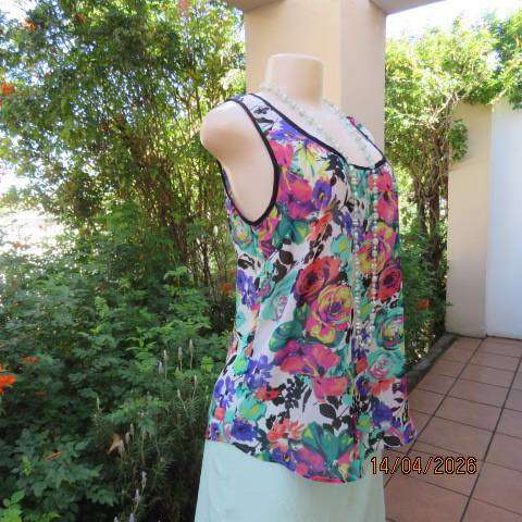Vibrant floral sleeveless sheer polyester top with black edging and back tie - Size 36
