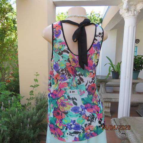 Vibrant floral sleeveless sheer polyester top with black edging and back tie - Size 36