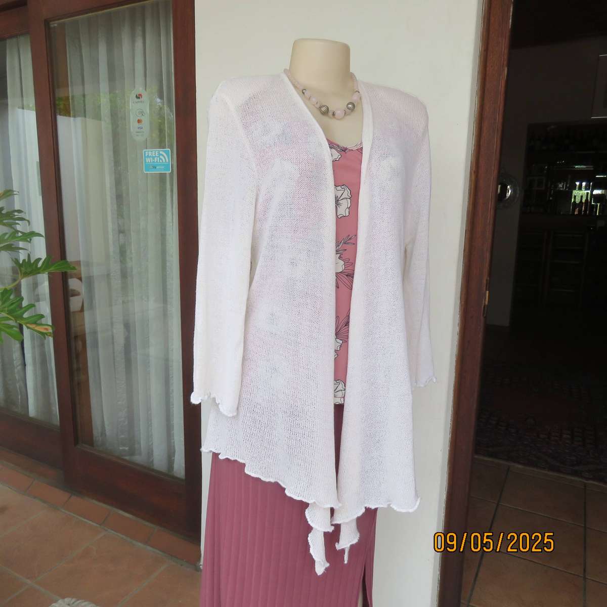 Cream acrylic knit waterfall style open front cardigan. Lace stitch back. Size 44