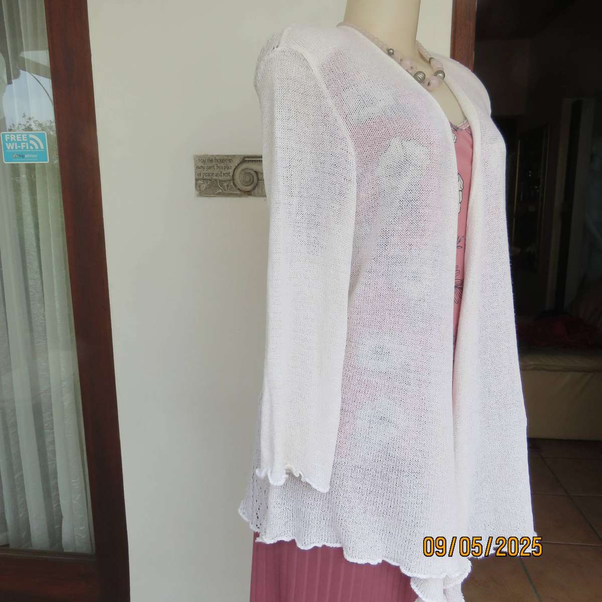 Cream acrylic knit waterfall style open front cardigan. Lace stitch back. Size 44