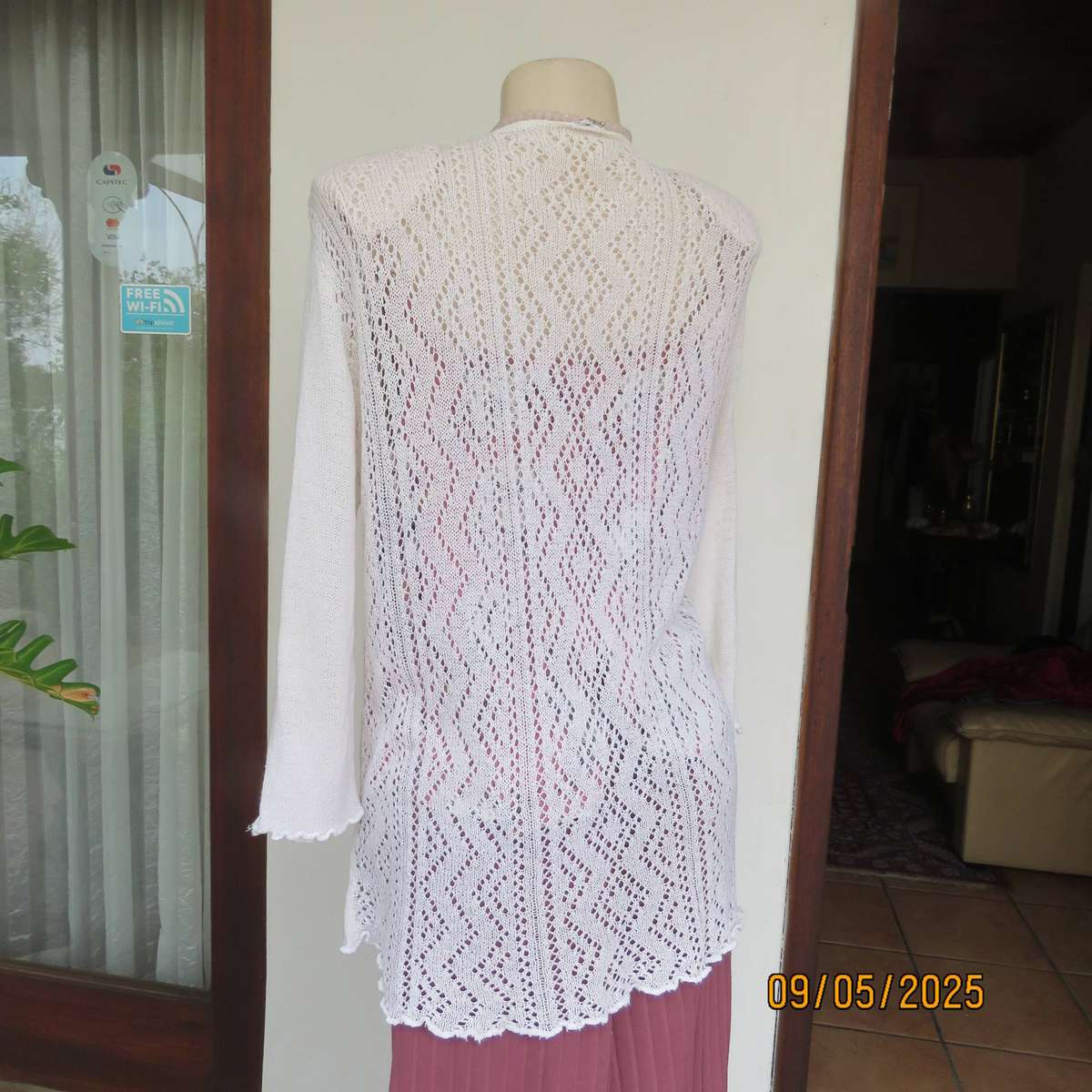 Cream acrylic knit waterfall style open front cardigan. Lace stitch back. Size 44