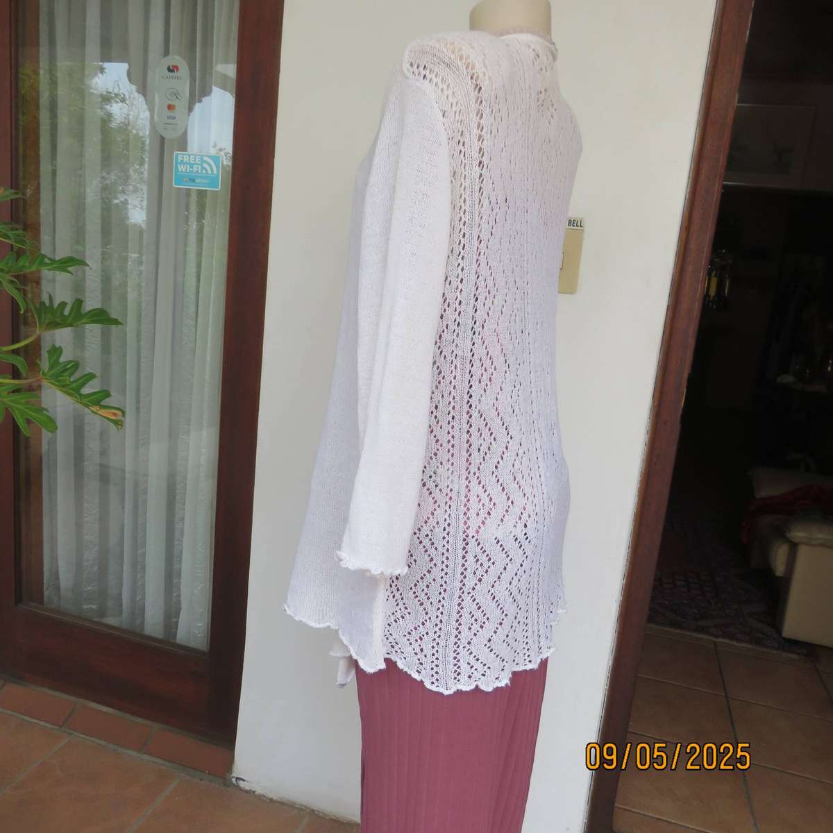 Cream acrylic knit waterfall style open front cardigan. Lace stitch back. Size 44