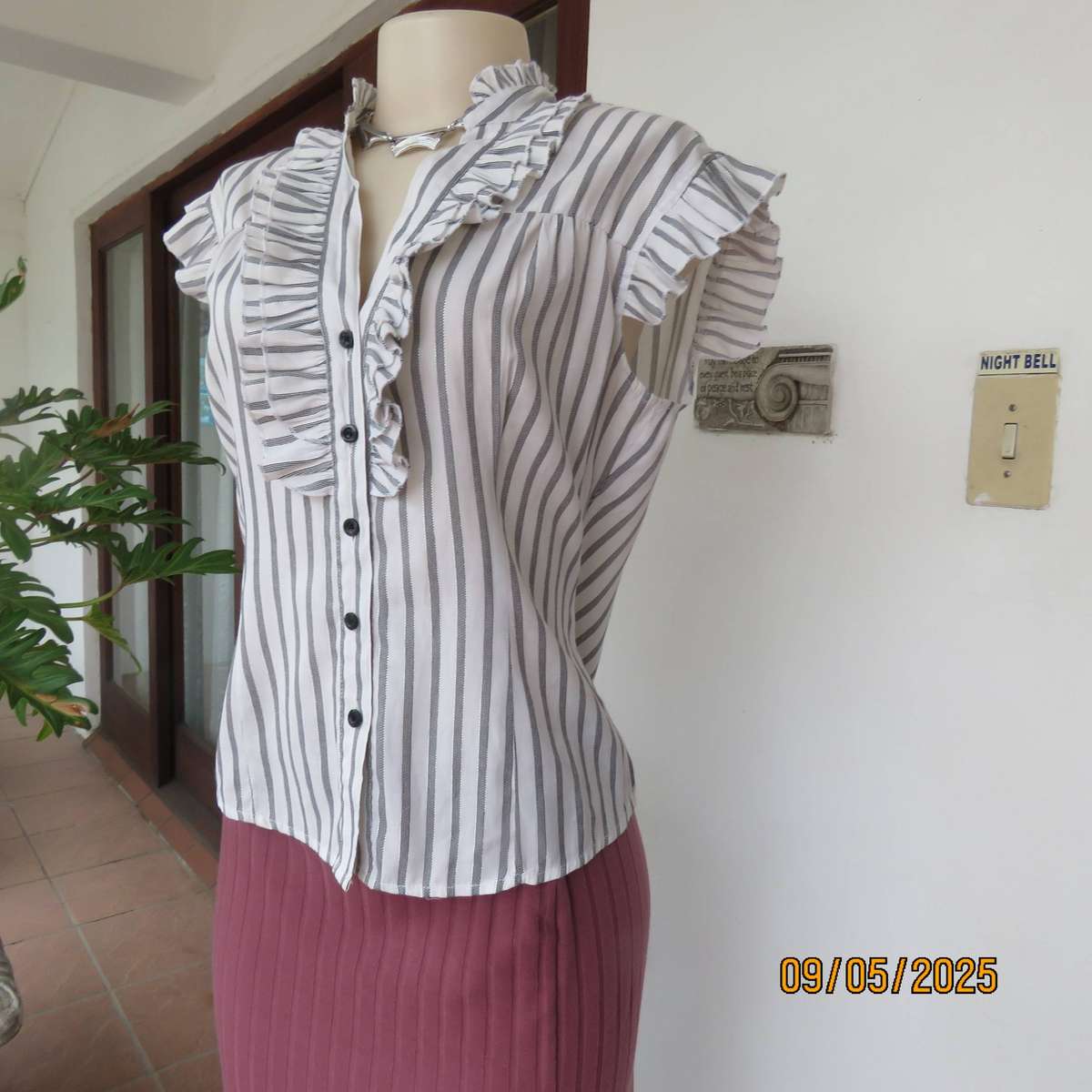 White polycotton stretch vertical black-silver striped top. V frilled neck. Size 32-34