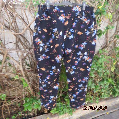 DONNA black stretch polyester skinny pants with blue and crimson floral print, size 46