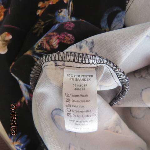 DONNA black stretch polyester skinny pants with blue and crimson floral print, size 46