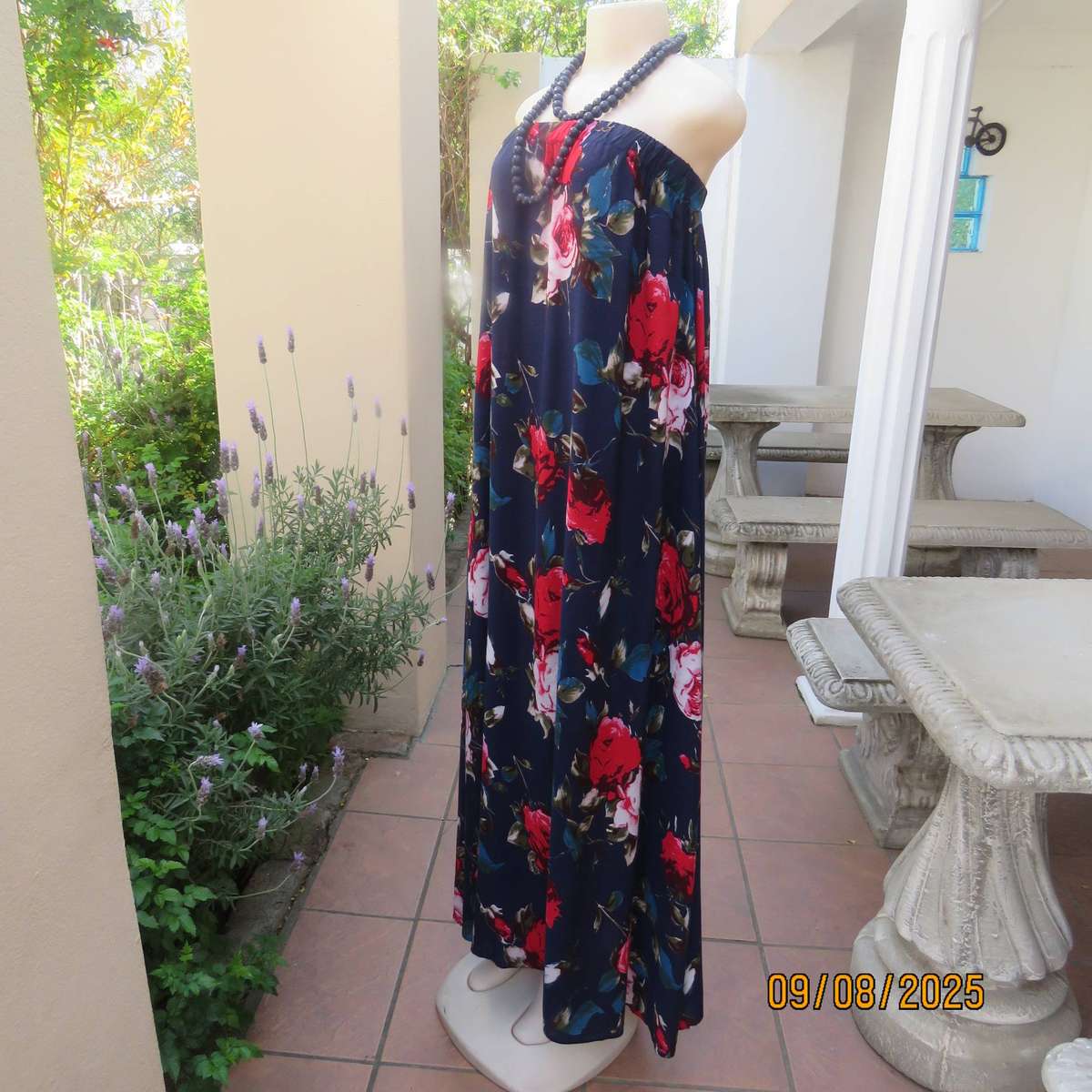 Navy maxi viscose strapless dress with bold red roses. Elasticated neckline. Size 34-38