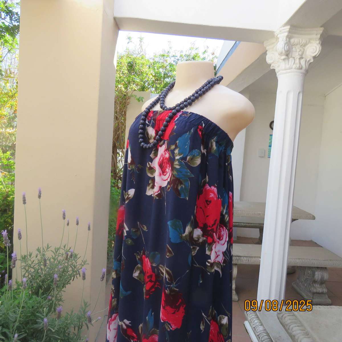 Navy maxi viscose strapless dress with bold red roses. Elasticated neckline. Size 34-38
