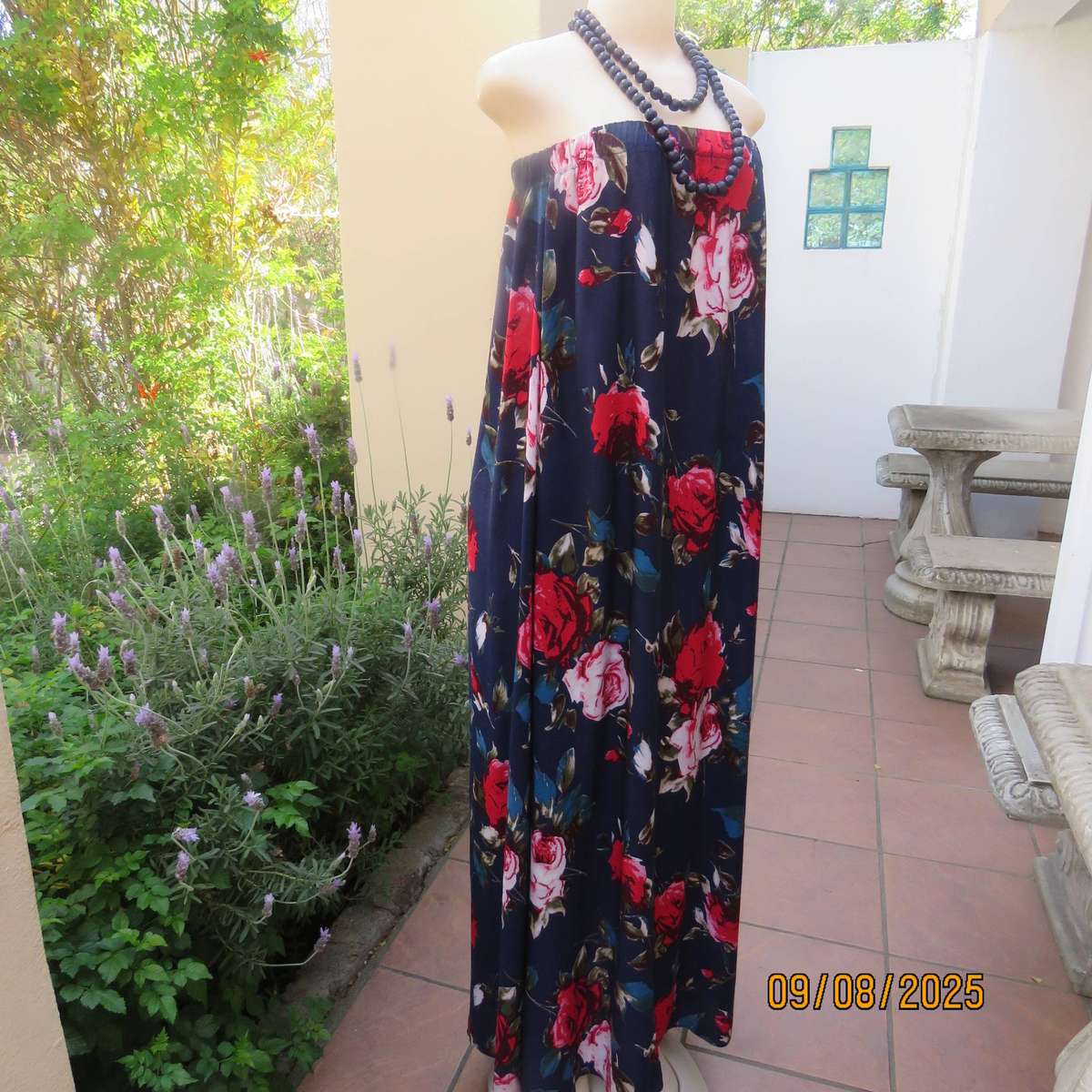 Navy maxi viscose strapless dress with bold red roses. Elasticated neckline. Size 34-38