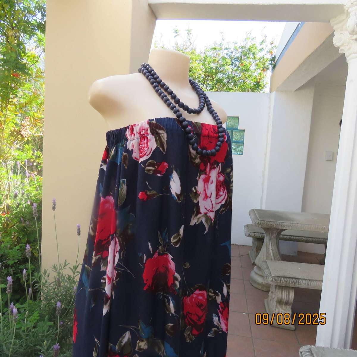 Navy maxi viscose strapless dress with bold red roses. Elasticated neckline. Size 34-38