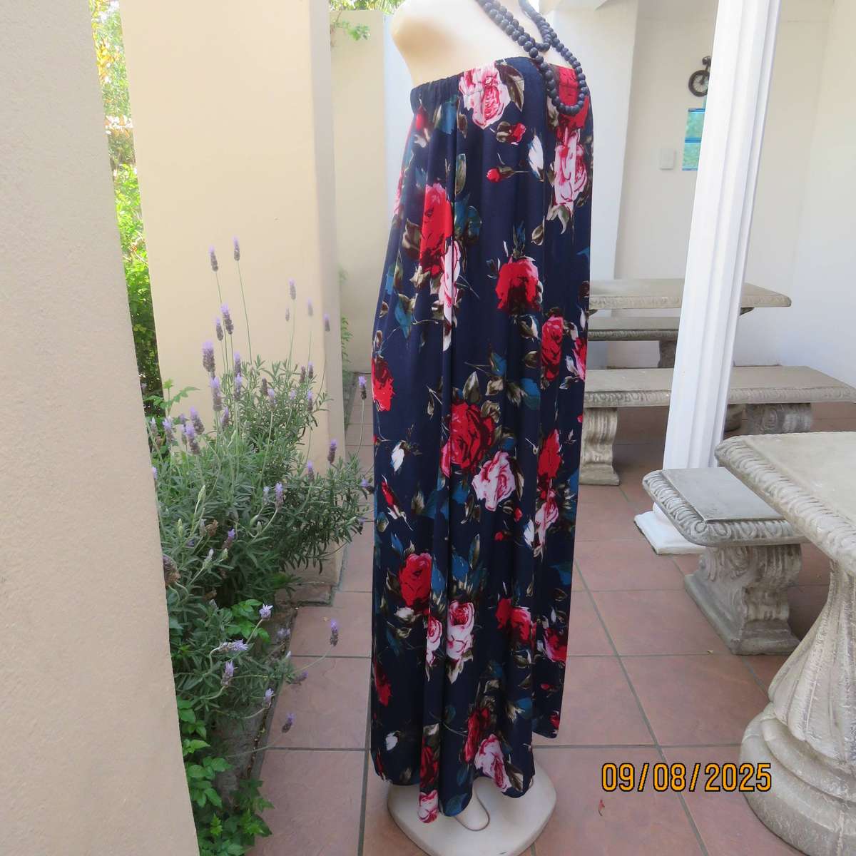 Navy maxi viscose strapless dress with bold red roses. Elasticated neckline. Size 34-38