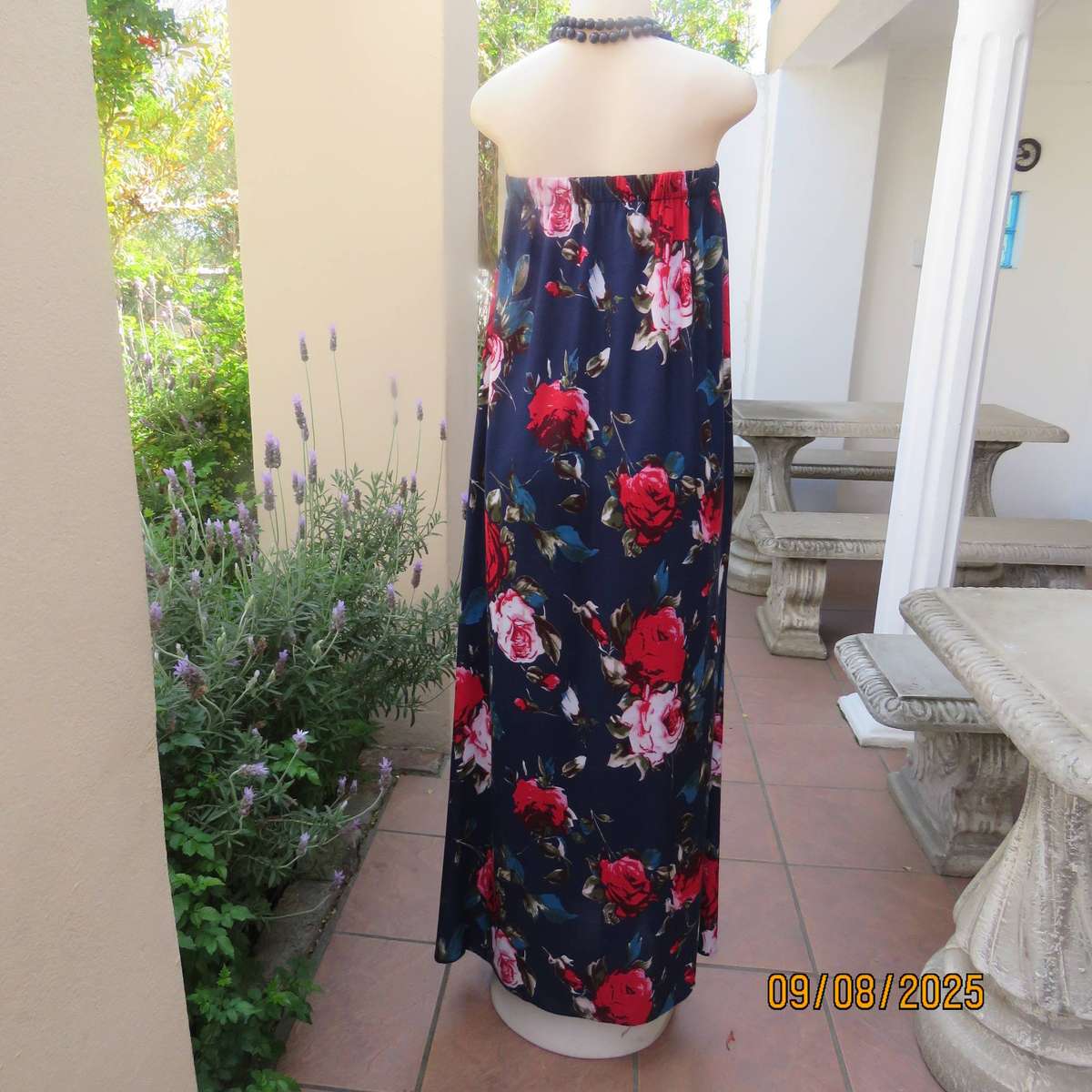 Navy maxi viscose strapless dress with bold red roses. Elasticated neckline. Size 34-38
