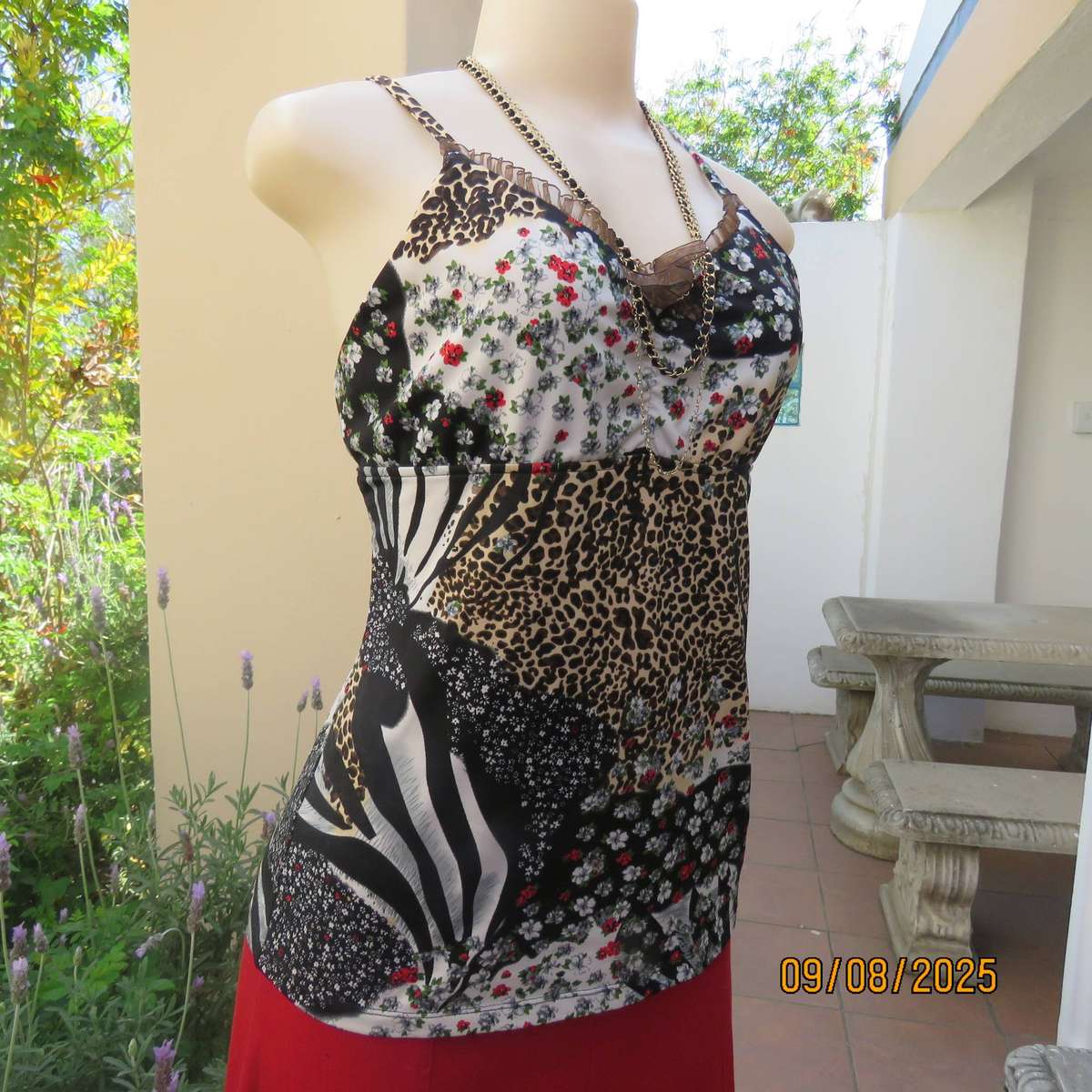 Animal print with tiny red-white floral print stretch polyester strappy top. Size 36