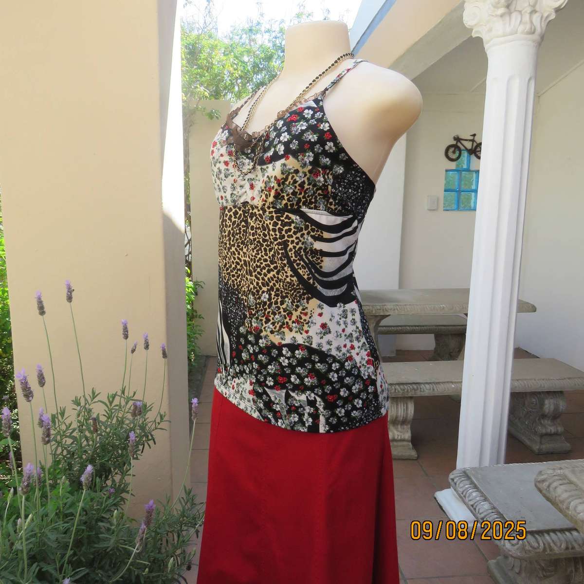 Animal print with tiny red-white floral print stretch polyester strappy top. Size 36