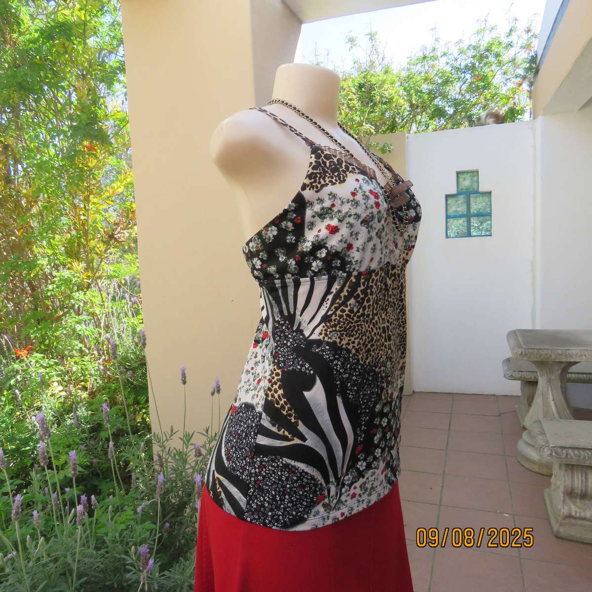 Animal print with tiny red-white floral print stretch polyester strappy top. Size 36