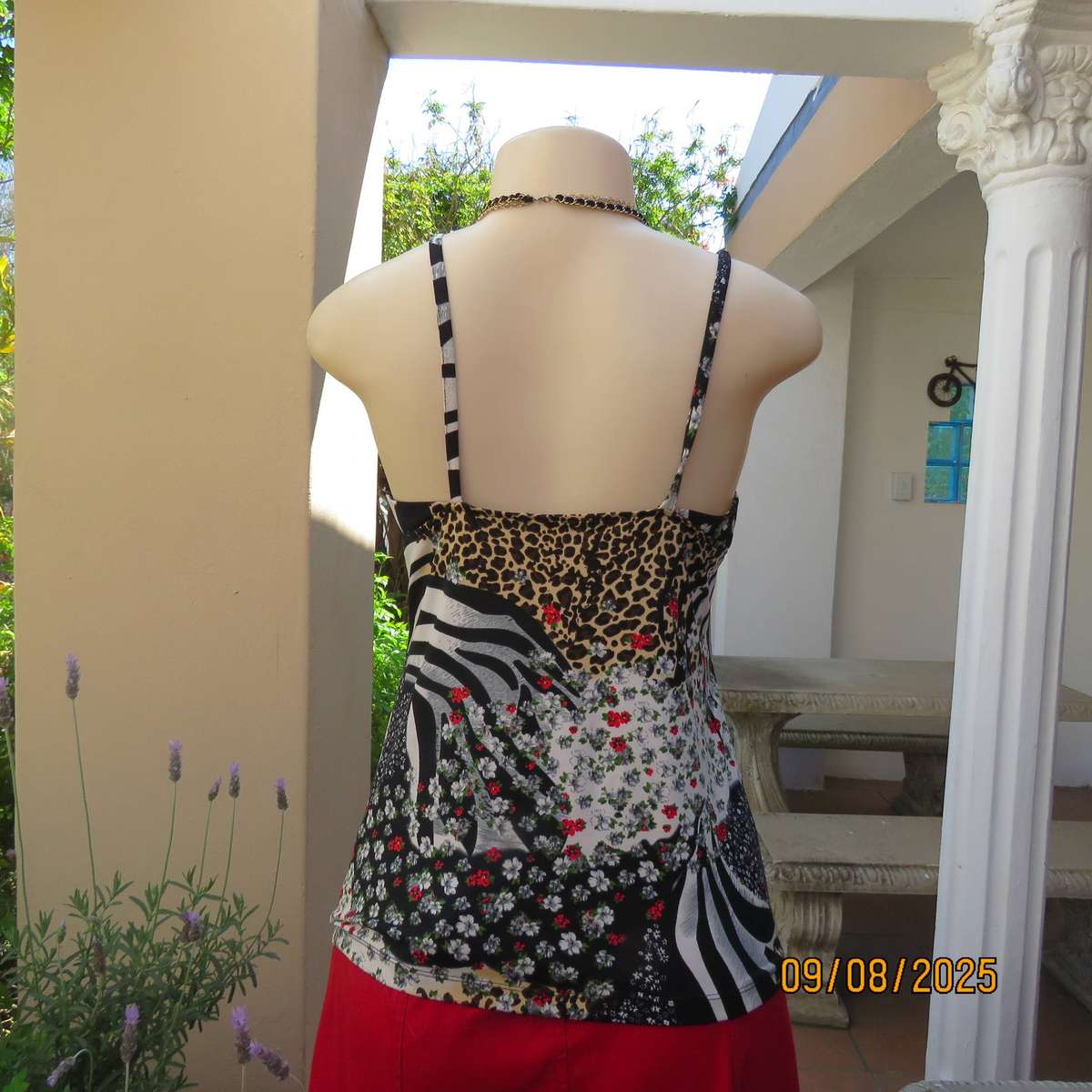 Animal print with tiny red-white floral print stretch polyester strappy top. Size 36