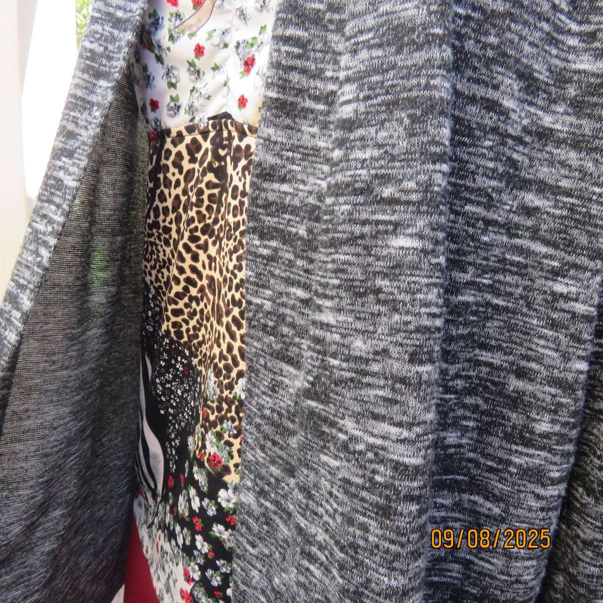 Black-white mottled light weight long sleeve open front stretch polyester cardigan . Size 42
