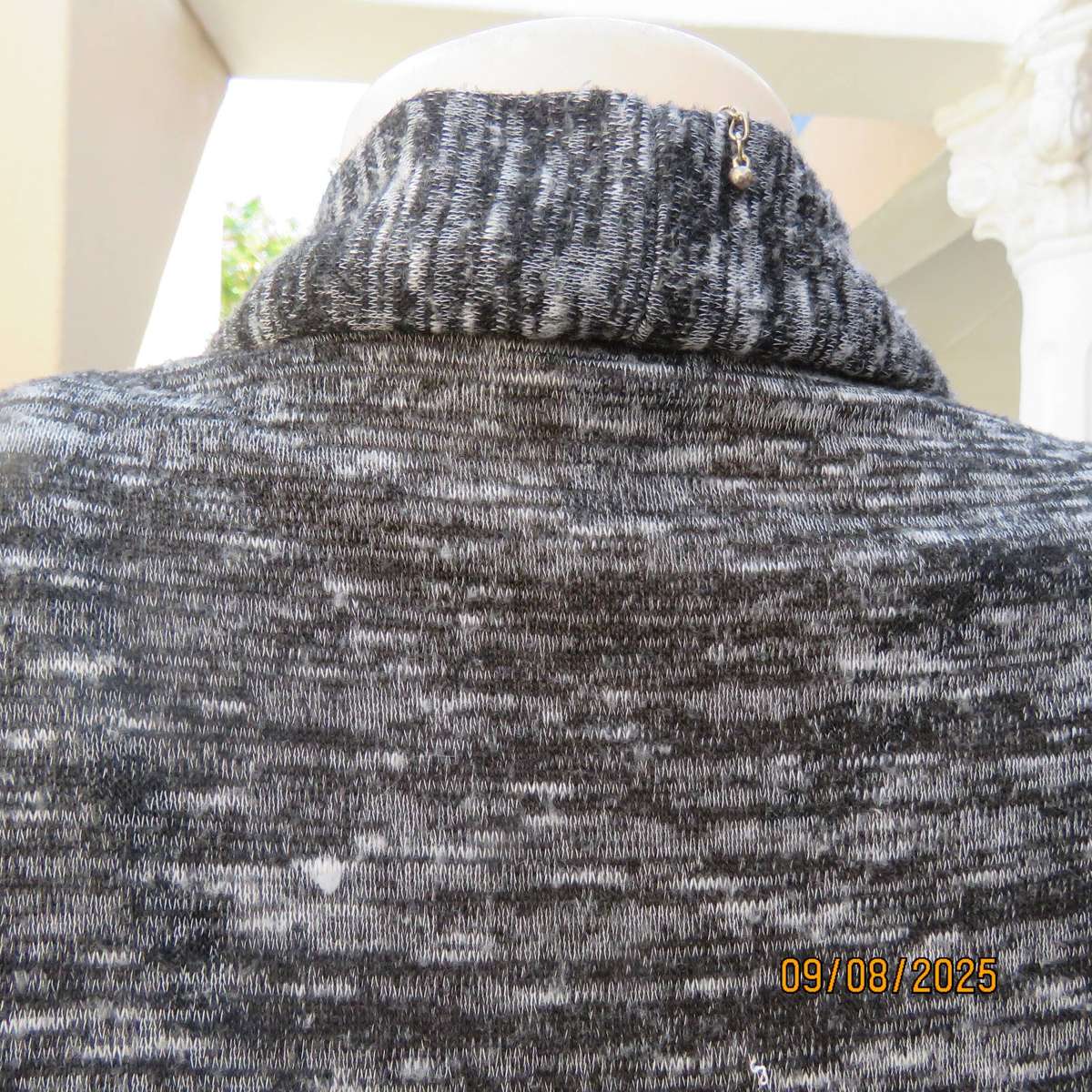 Black-white mottled light weight long sleeve open front stretch polyester cardigan . Size 42