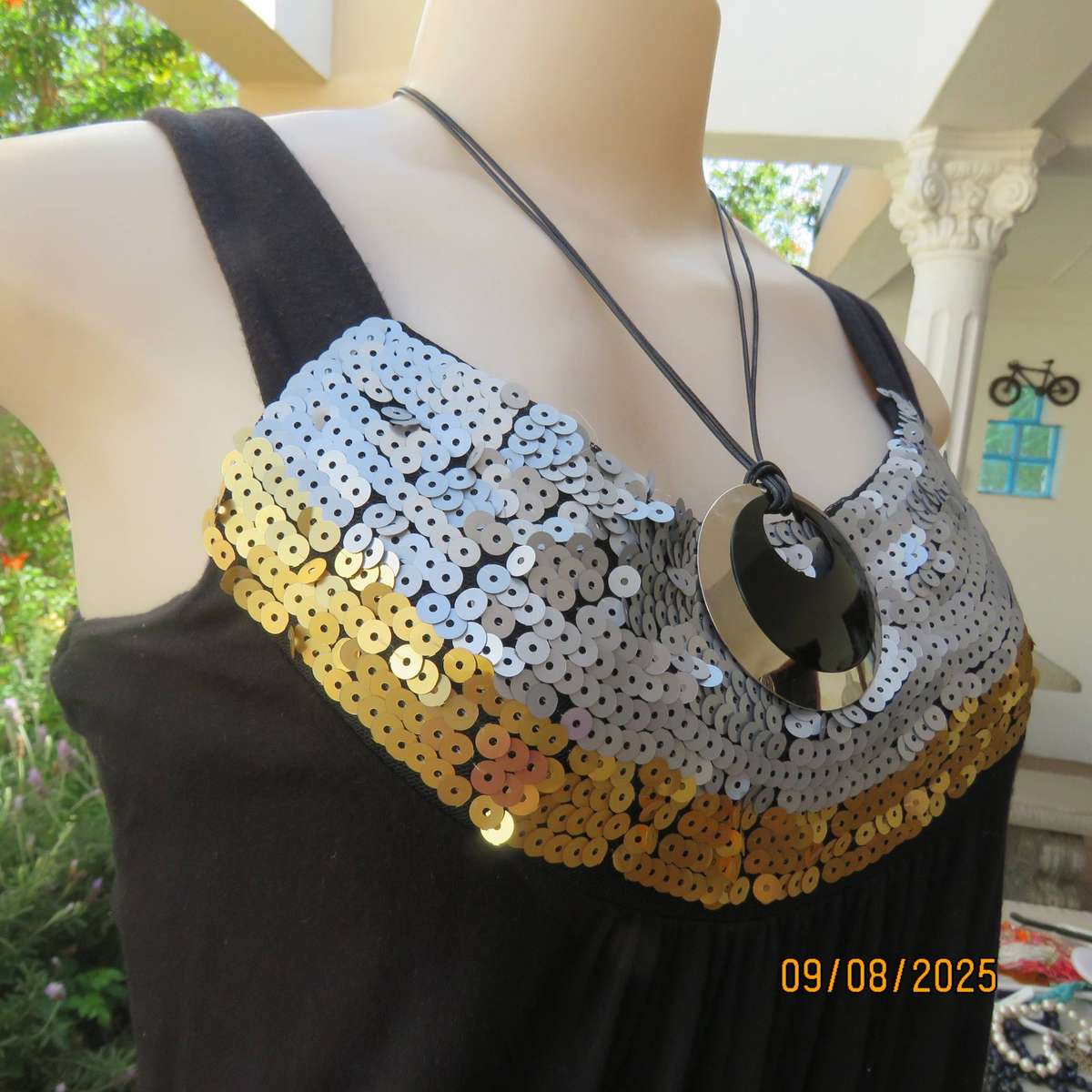 OASIS black stretch rayon slip over top front yoke richly sequined. Size 36