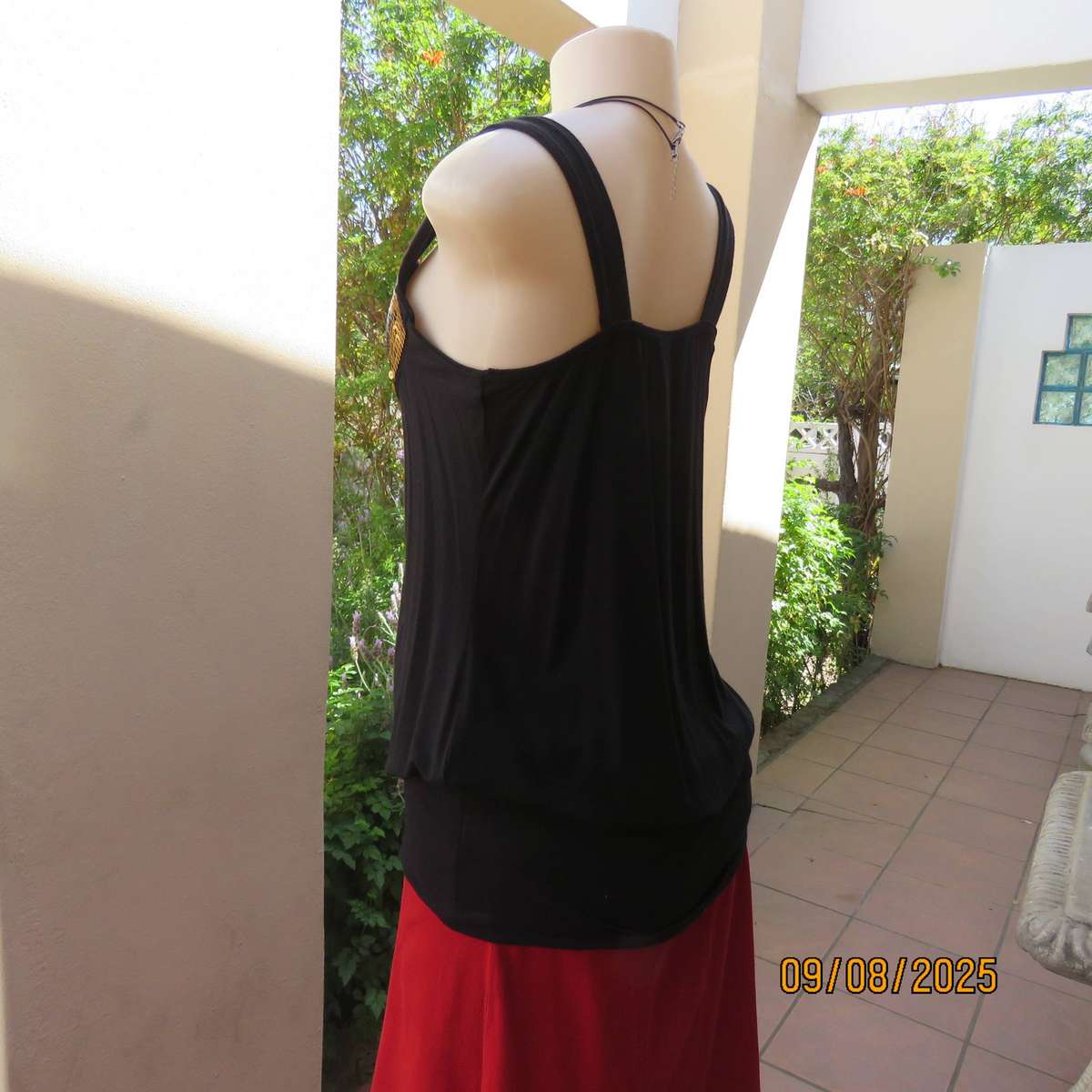 OASIS black stretch rayon slip over top front yoke richly sequined. Size 36