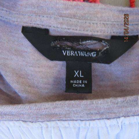 VERA WANG slip-over top with creased white polyester front and stretch rayon back, size 44-46