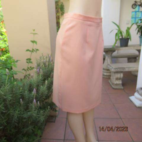 Light peach polyester pencil skirt with back zip and pleat, size 36