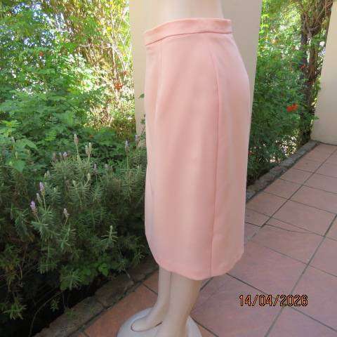 Light peach polyester pencil skirt with back zip and pleat, size 36
